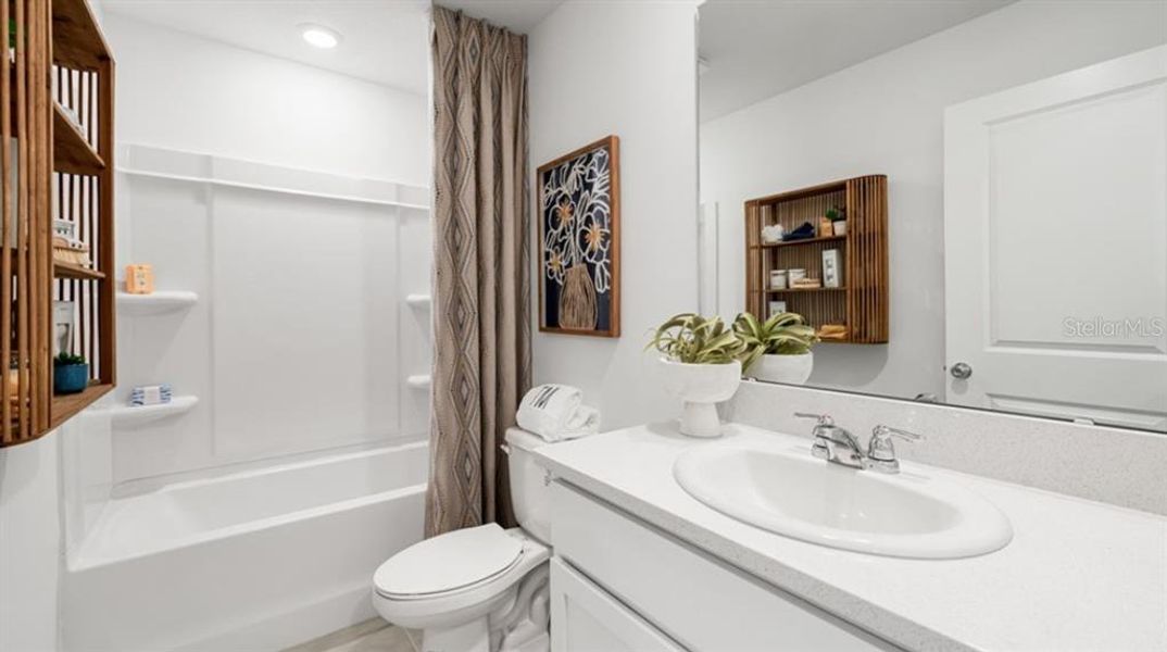 Furnished interior view inside a new home in The Towns at Firethorn, Parrish (Image 13).