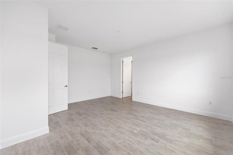 Spacious, unfurnished interior of a new home in On Top of the World Communities, Ocala (Image 37).