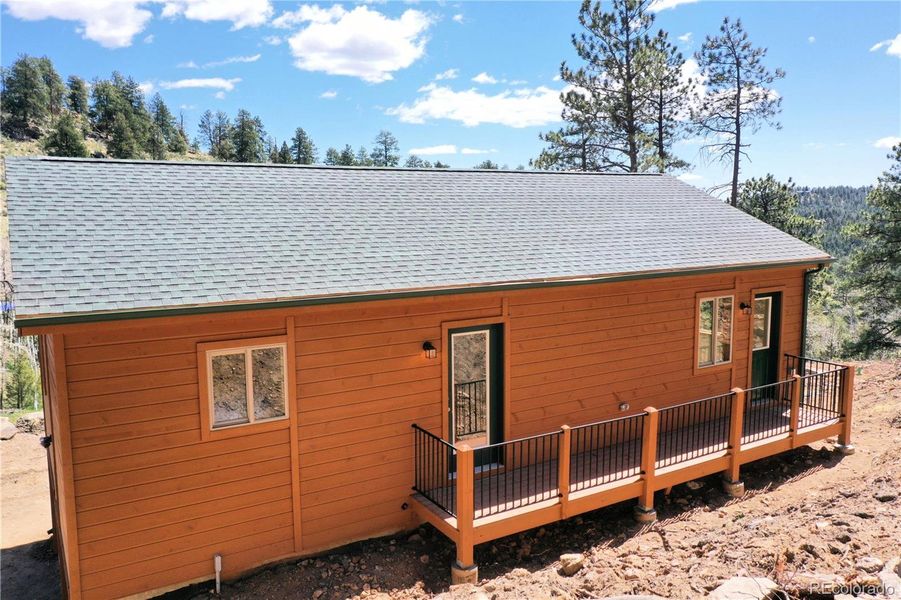 Front exterior of a new home in , Bailey, CO, highlighting curb appeal (Image 15). Front exterior of a new home in , Bailey, CO, highlighting curb appeal (Image 15).