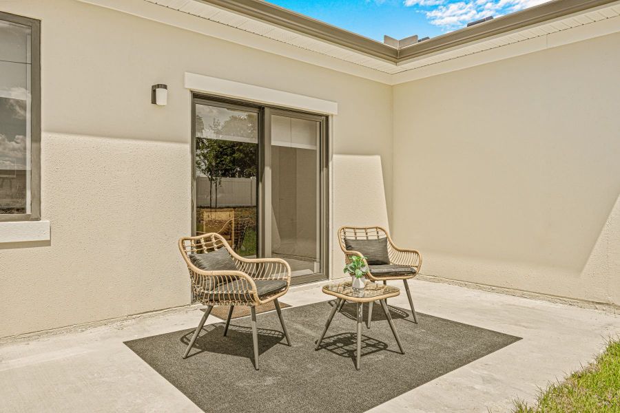 Representative furnished interior of a home built from the Model 1 M-2 by Onx Homes in On Villa Pass, Mascotte (Image 42).
