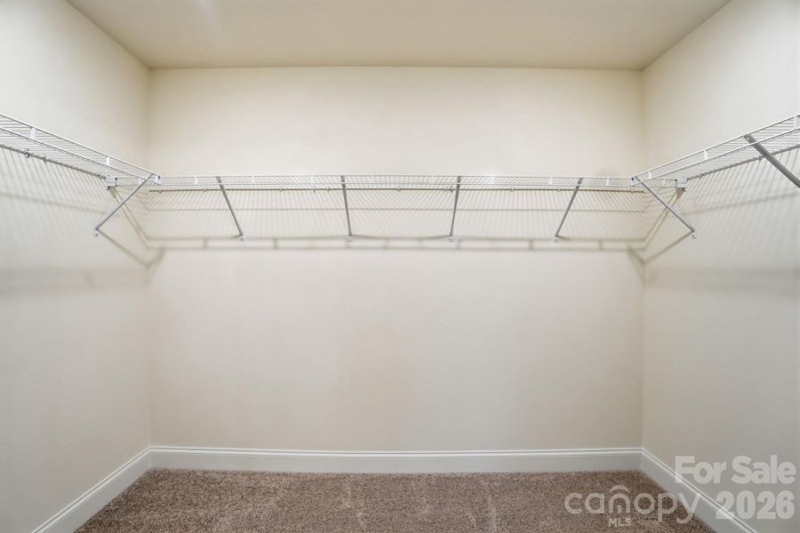 Primary Walk in Closet Primary Walk in Closet