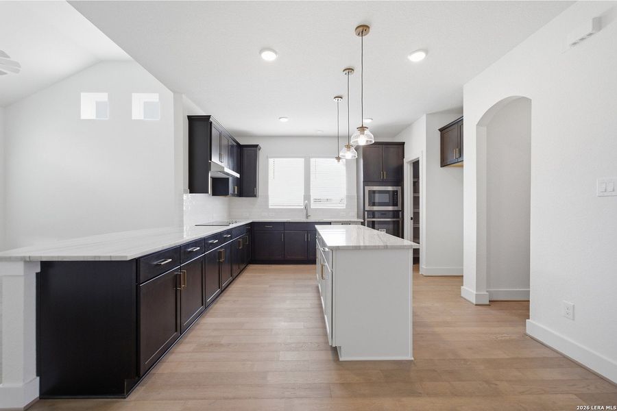 Furnished interior view inside a new home in Megan's Landing, Castroville (Image 7).