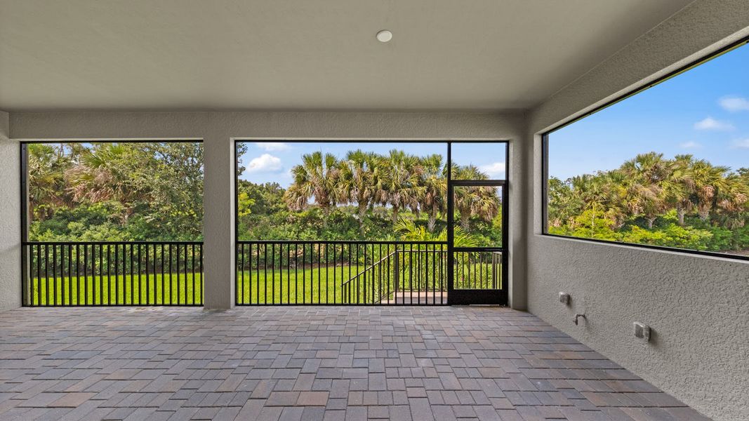 Exterior details and patio area of a home in Verandah Real Estate and Homes for Sale in Fort Myers, FL - Neal Communities, Fort Myers (Image 19).
