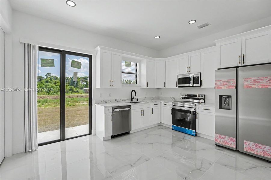 Furnished interior view inside a new home in , Lehigh Acres (Image 7).