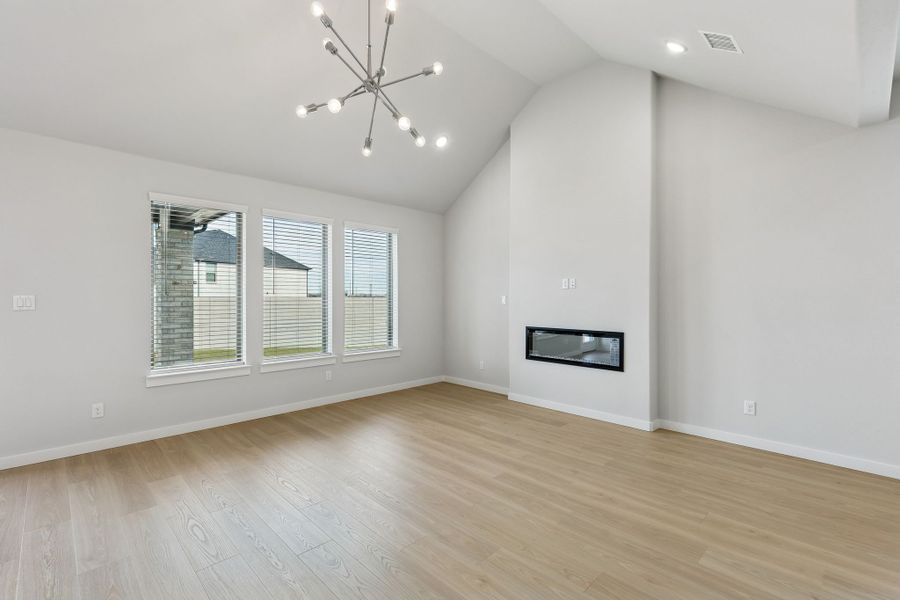 Living Room in the Stanley II home plan by Trophy Signature Homes – REPRESENTATIVE PHOTO Living Room in the Stanley II home plan by Trophy Signature Homes – REPRESENTATIVE PHOTO