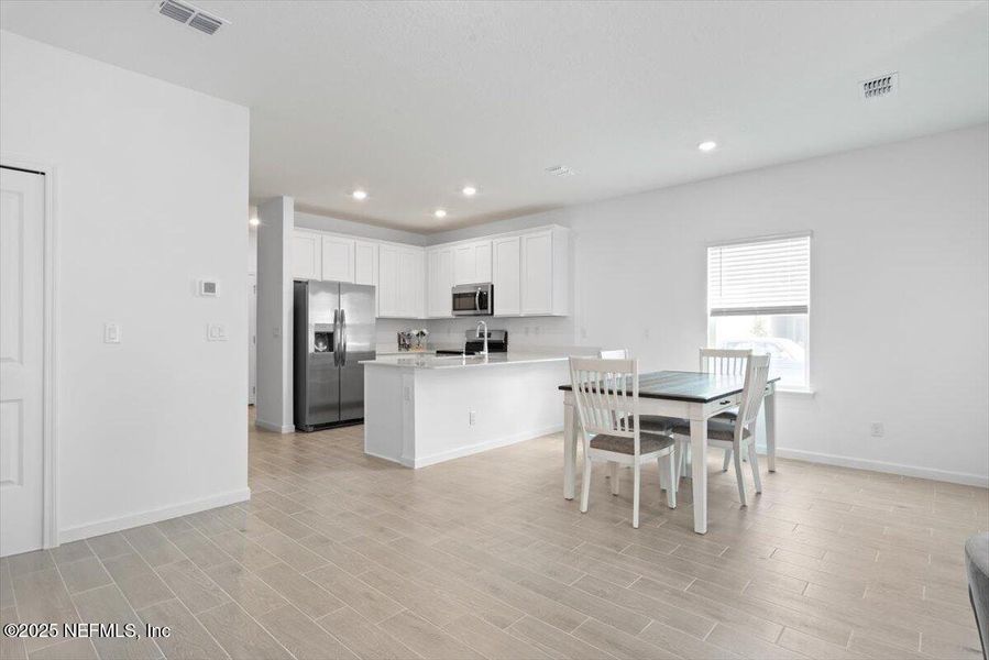 Furnished interior view inside a new home in Hardwick Farms: Hardwick Farms - Townhome Collection, Jacksonville (Image 15).