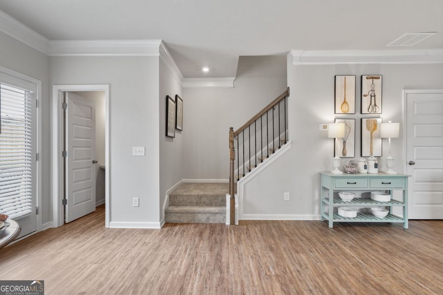 Furnished interior view inside a new home in Crescent Towns, Riverdale (Image 8).