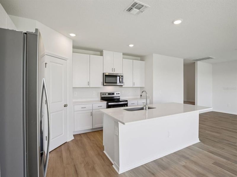 Furnished interior view inside a new home in Oakfield Trails - Premier Series, Parrish (Image 3).