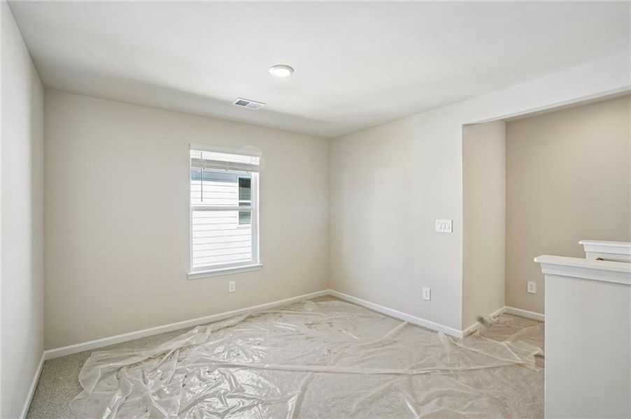 Spacious, unfurnished interior of a new home in Hawthorne Station, College Park (Image 33).