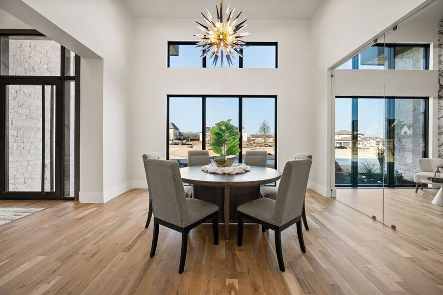 Dining area with a notable chandelier