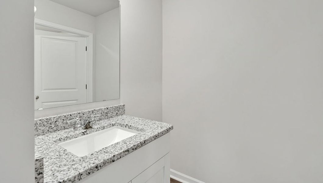 Representative furnished interior of a home built from the HAYDEN by D.R. Horton in Cedar Hill Landing, Navassa (Image 10).