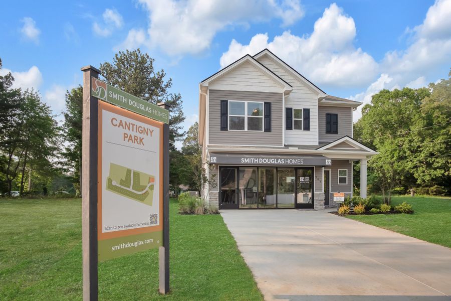 Front exterior of a new home in Cantigny Park, Clarksville, TN, highlighting curb appeal (Image 2). Front exterior of a new home in Cantigny Park, Clarksville, TN, highlighting curb appeal (Image 2).
