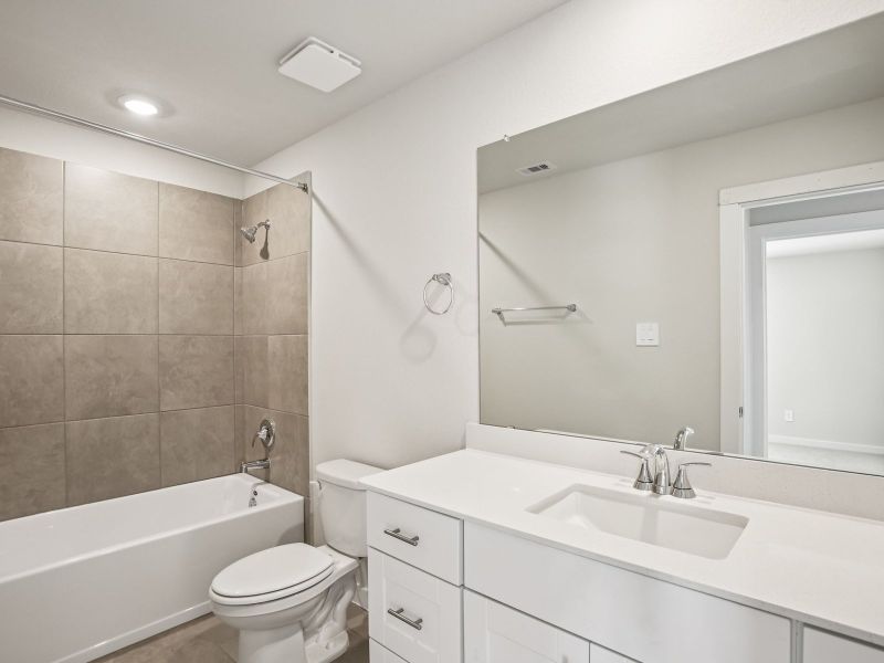 Furnished interior view inside a new home in Sundance Cove - Premier Series, Crosby (Image 10).