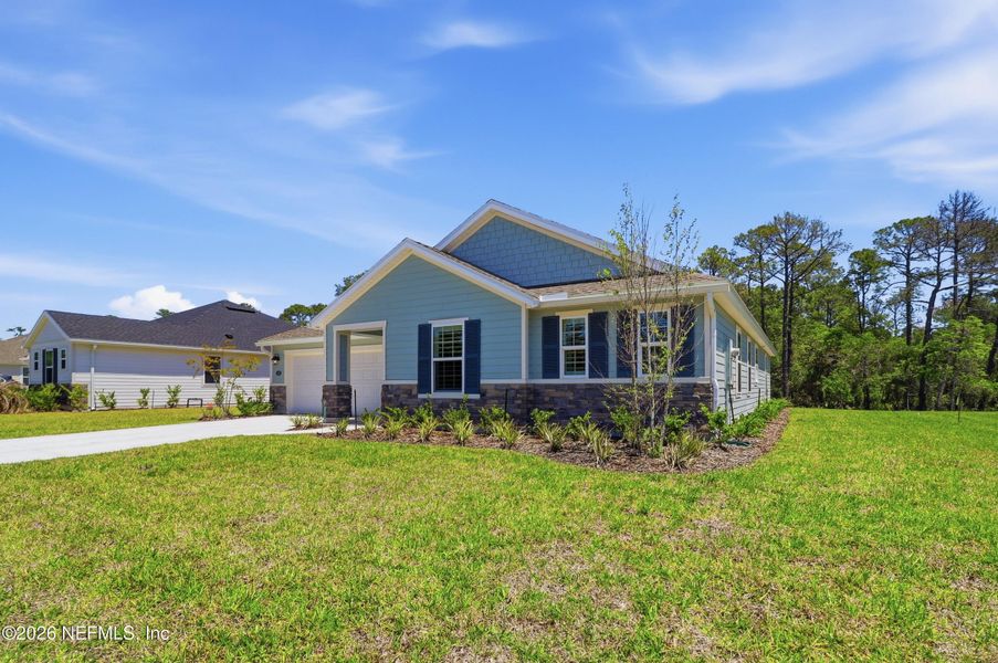Front exterior of a new home in , St. Augustine, FL, highlighting curb appeal (Image 23).