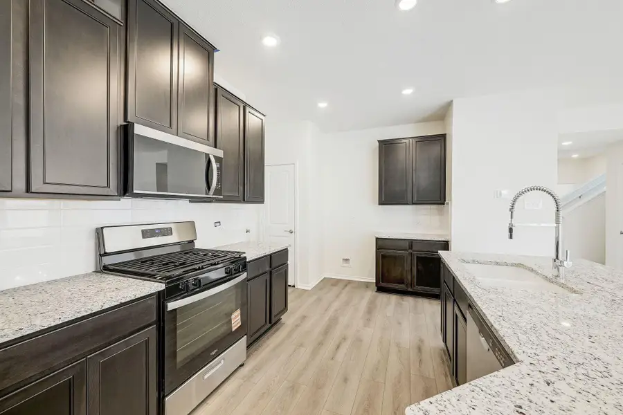 Furnished interior view inside a new home in Salerno - Heritage Collection, Round Rock (Image 11). Furnished interior view inside a new home in Salerno - Heritage Collection, Round Rock (Image 11).