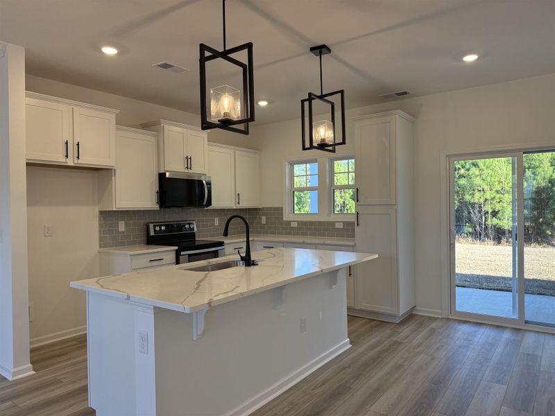 Furnished interior view inside a new home in Westwood Reserve, Conway (Image 5).