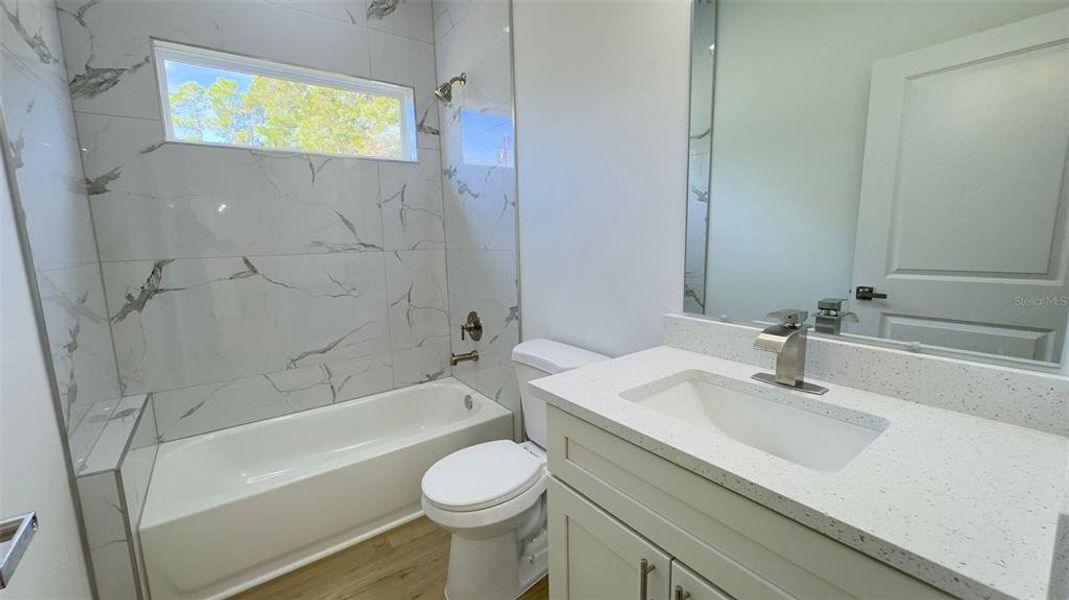 Furnished interior view inside a new home in , Dunnellon (Image 9).