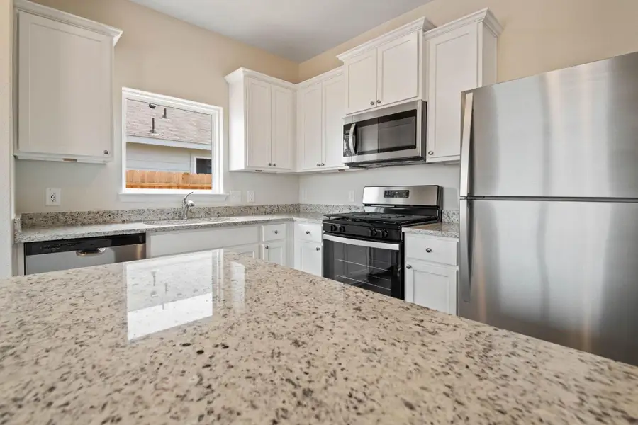 Furnished interior view inside a new home in Trails at Cochran Ranch, Waller (Image 7).