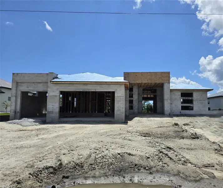 Front exterior of a new home in , Port Charlotte, FL, highlighting curb appeal (Image 1). Front exterior of a new home in , Port Charlotte, FL, highlighting curb appeal (Image 1).
