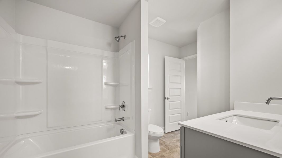 Representative furnished interior of a home built from the Packard by D.R. Horton in Evergreen Crossing, Locust Grove (Image 11).