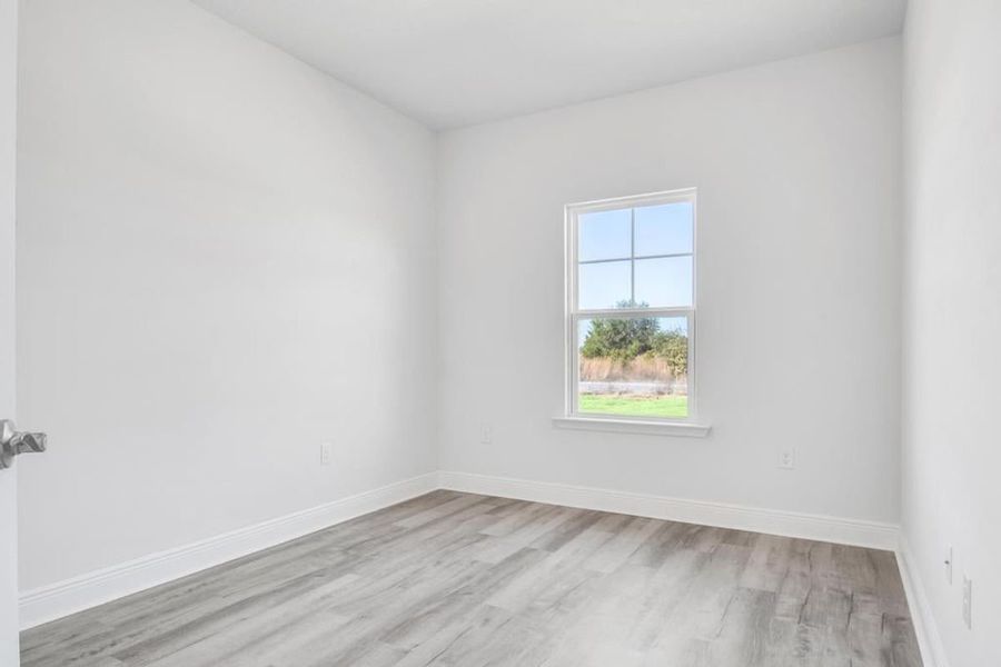 Representative unfurnished interior of a home built from the Plan 1530 by Adams Homes in Ridgeway Landing, Crestview (Image 19).