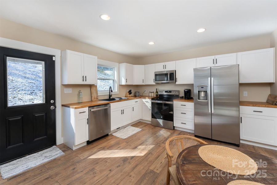 Furnished interior view inside a new home in , Asheville (Image 14).