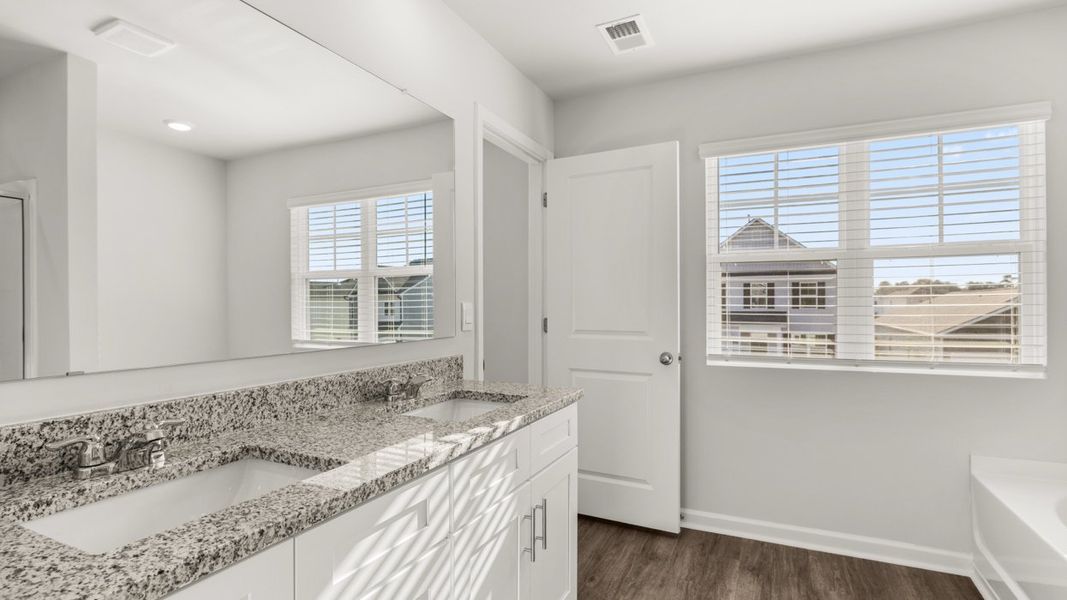 Representative furnished interior of a home built from the Somerset by D.R. Horton in Highland Hills, Graniteville (Image 8).