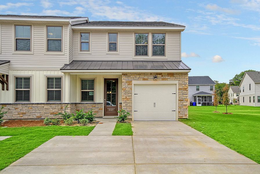 Front exterior of a new home in Tributary At The Park At Rivers Edge, North Charleston, SC, highlighting curb appeal (Image 25).