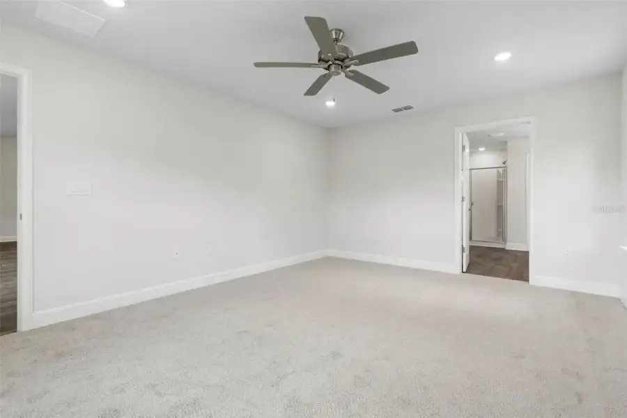 Representative unfurnished interior of a home built from the 2117 by Adams Homes in Flagler Estates, Hastings (Image 25).