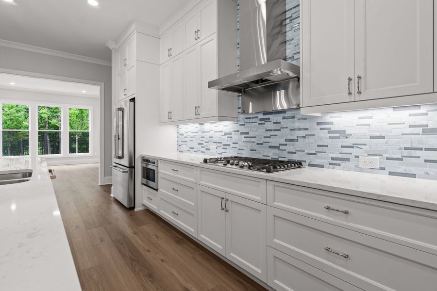 Representative furnished interior of a home built from the The Danville by The Providence Group in Bellwyn, Alpharetta (Image 11).