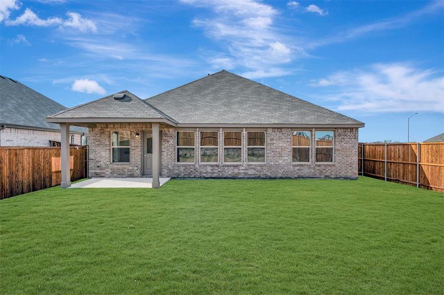 Exterior details and patio area of a home in Meadow Park, Ponder (Image 4). Exterior details and patio area of a home in Meadow Park, Ponder (Image 4).