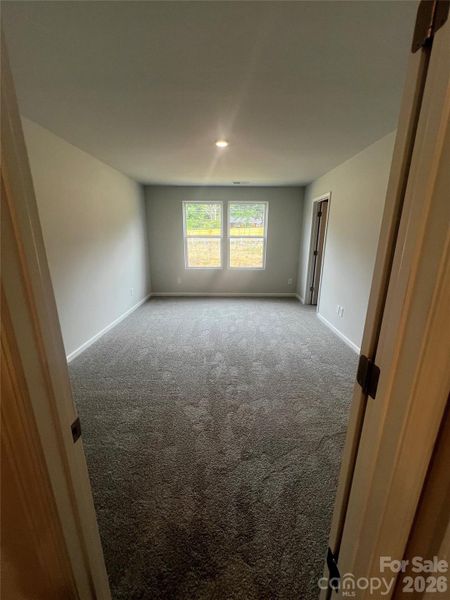 Spacious, unfurnished interior of a new home in Townes at Ribbon Walk, Charlotte (Image 11).