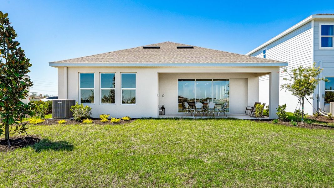Representative exterior photo of a completed home built from the Grenada by Taylor Morrison in Indigo Creek, Apollo Beach, FL (Image 20).