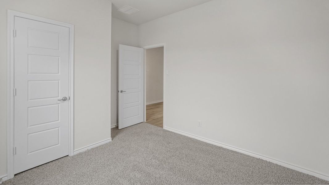 Spacious, unfurnished interior of a new home in Fireside by the Lake, Garland (Image 22).