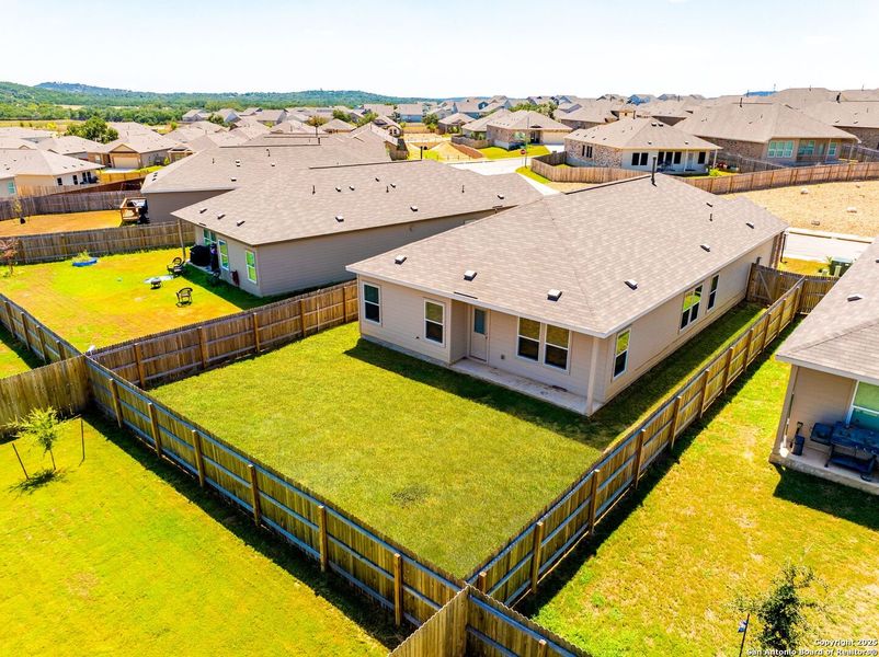 Front exterior of a new home in , Bulverde, TX, highlighting curb appeal (Image 22).