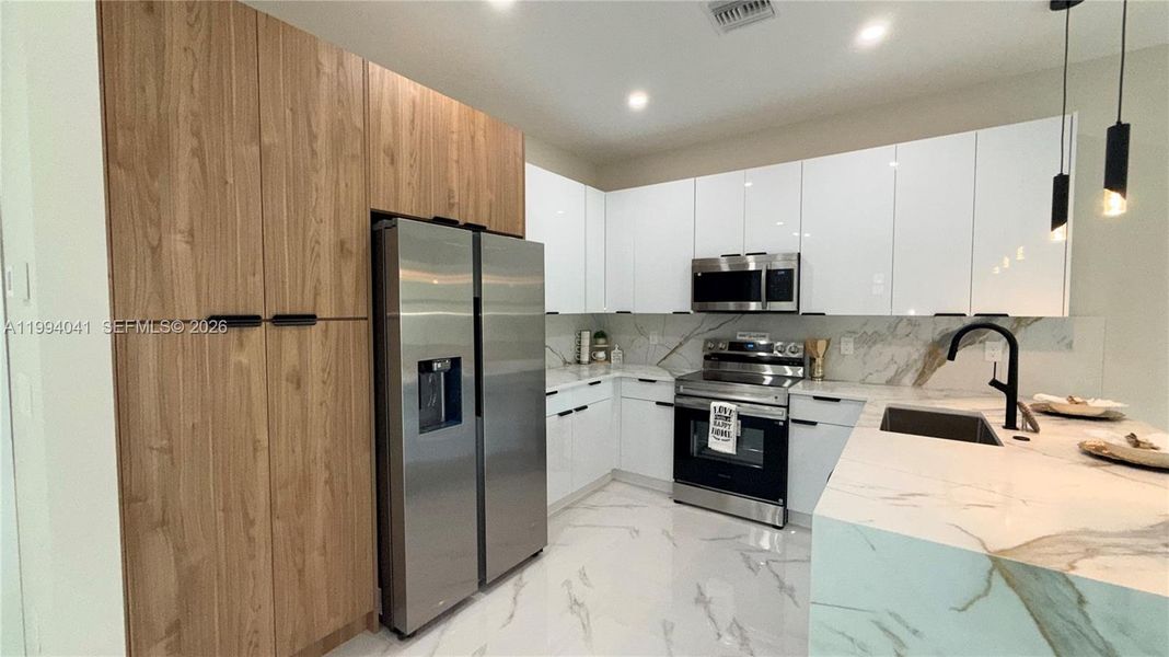 Furnished interior view inside a new home in , Lehigh Acres (Image 6).