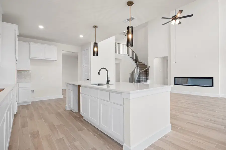 Furnished interior view inside a new home in Bridgeland, Cypress (Image 5).