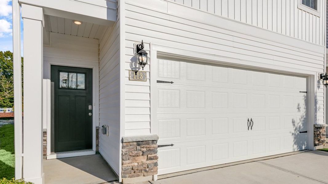 Front exterior of a new home in Brightwood Farm, Whitsett, NC, highlighting curb appeal (Image 2).