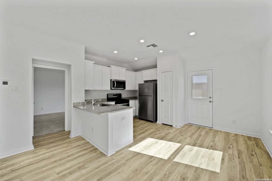Furnished interior view inside a new home in Preserve at Medina, Von Ormy (Image 4).