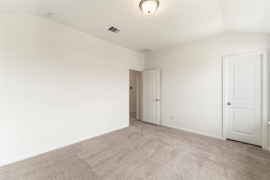 Spacious, unfurnished interior of a new home in Sunterra, Katy (Image 23).