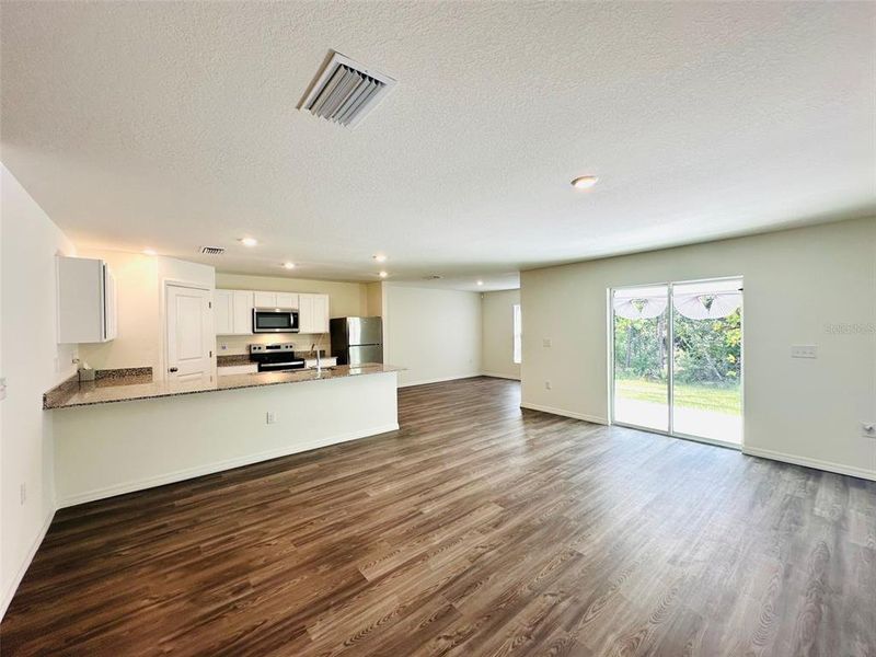 Spacious, unfurnished interior of a new home in , Port Charlotte (Image 24).