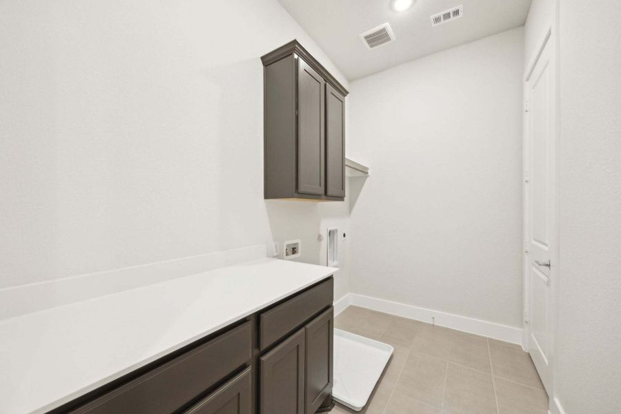 Furnished interior view inside a new home in Newman Village Townhomes, Frisco (Image 10).