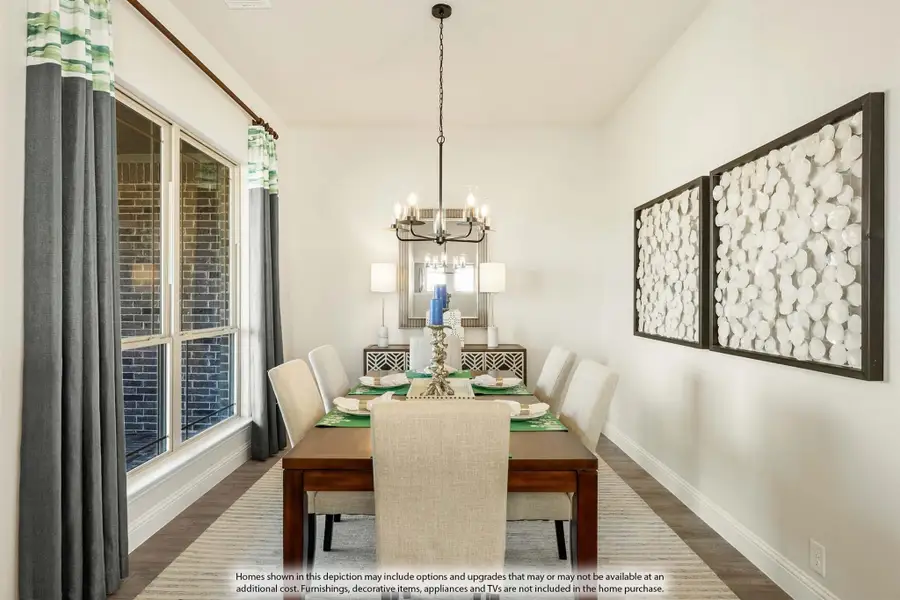 Formal dining room with wood table, upholstered chairs, chandelier, and large window with curtains
