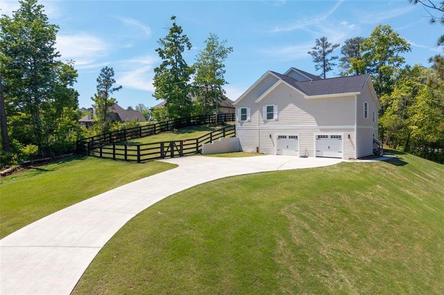 Front exterior of a new home in , Canton, GA, highlighting curb appeal (Image 24).