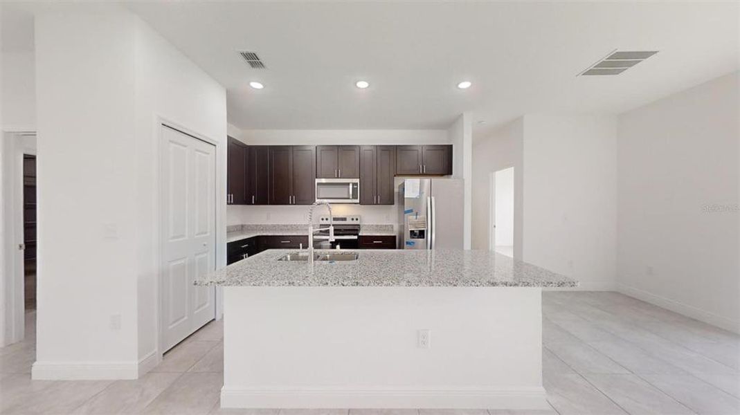 Furnished interior view inside a new home in , Dunnellon (Image 5).