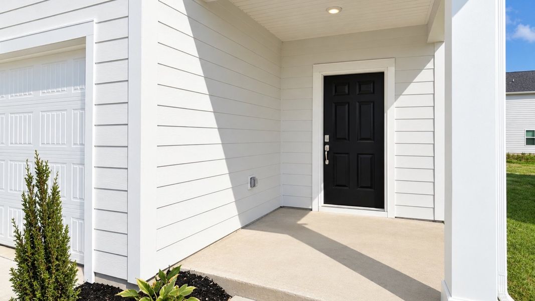 Front porch of beautiful two-story home in Shelbyville, Tennessee