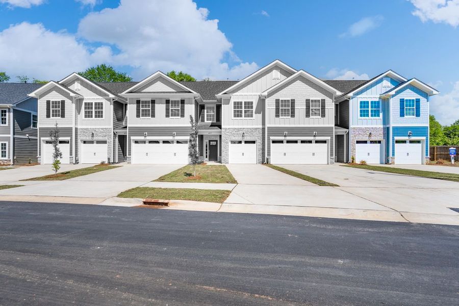 Front exterior of a new home in Pine Trace, Gastonia, NC, highlighting curb appeal (Image 1). Front exterior of a new home in Pine Trace, Gastonia, NC, highlighting curb appeal (Image 1).