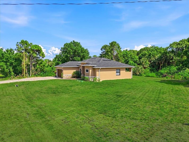 Exterior details and patio area of a home in , Lehigh Acres (Image 27).