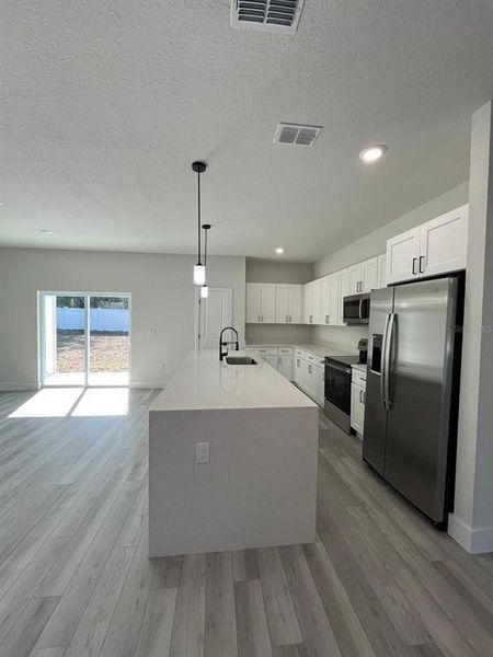 Furnished interior view inside a new home in , Citrus Springs (Image 8).