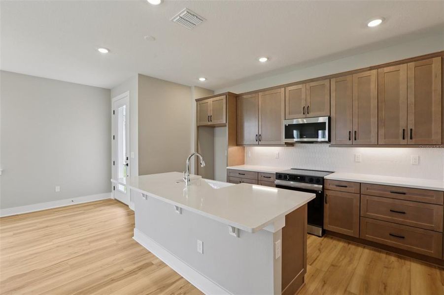 Furnished interior view inside a new home in Lagoon Residences at Epperson, Wesley Chapel (Image 14).